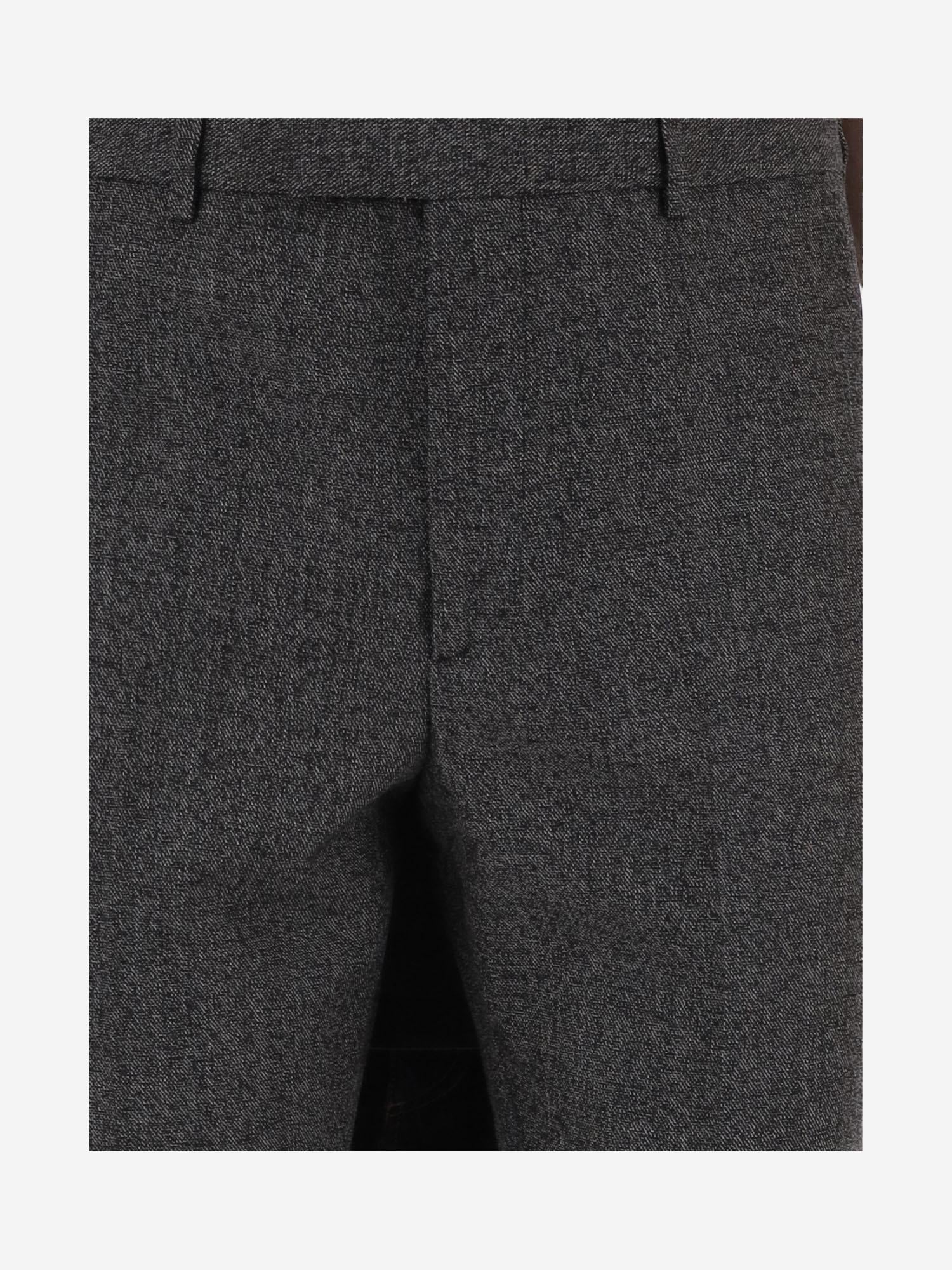 Pantaloni in tessuto mouliné in lana 850333 Z7AXC1070 GUCCI