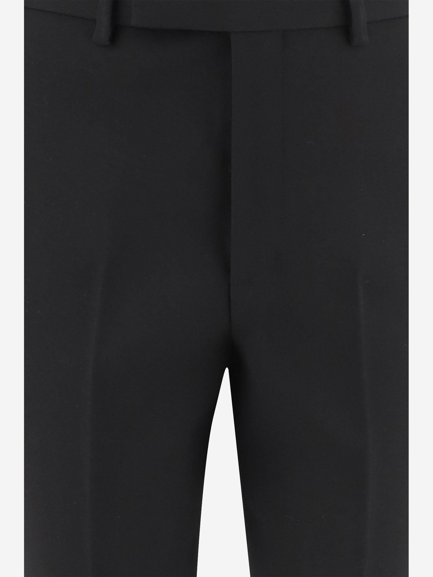 Pantaloni in lana 851042 Z7AXM1000 GUCCI