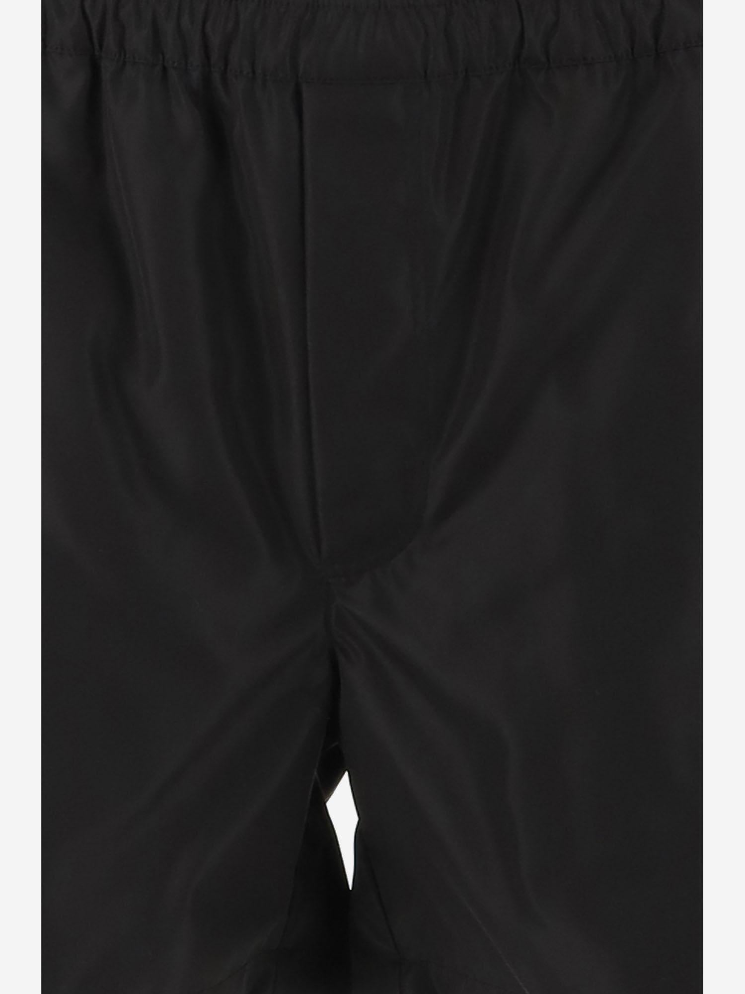 COSTUME DA BAGNO VLOGO SIGNATURE IN NYLON LEGGERO UNITO 6V3UHA286FN 0NO VALENTINO