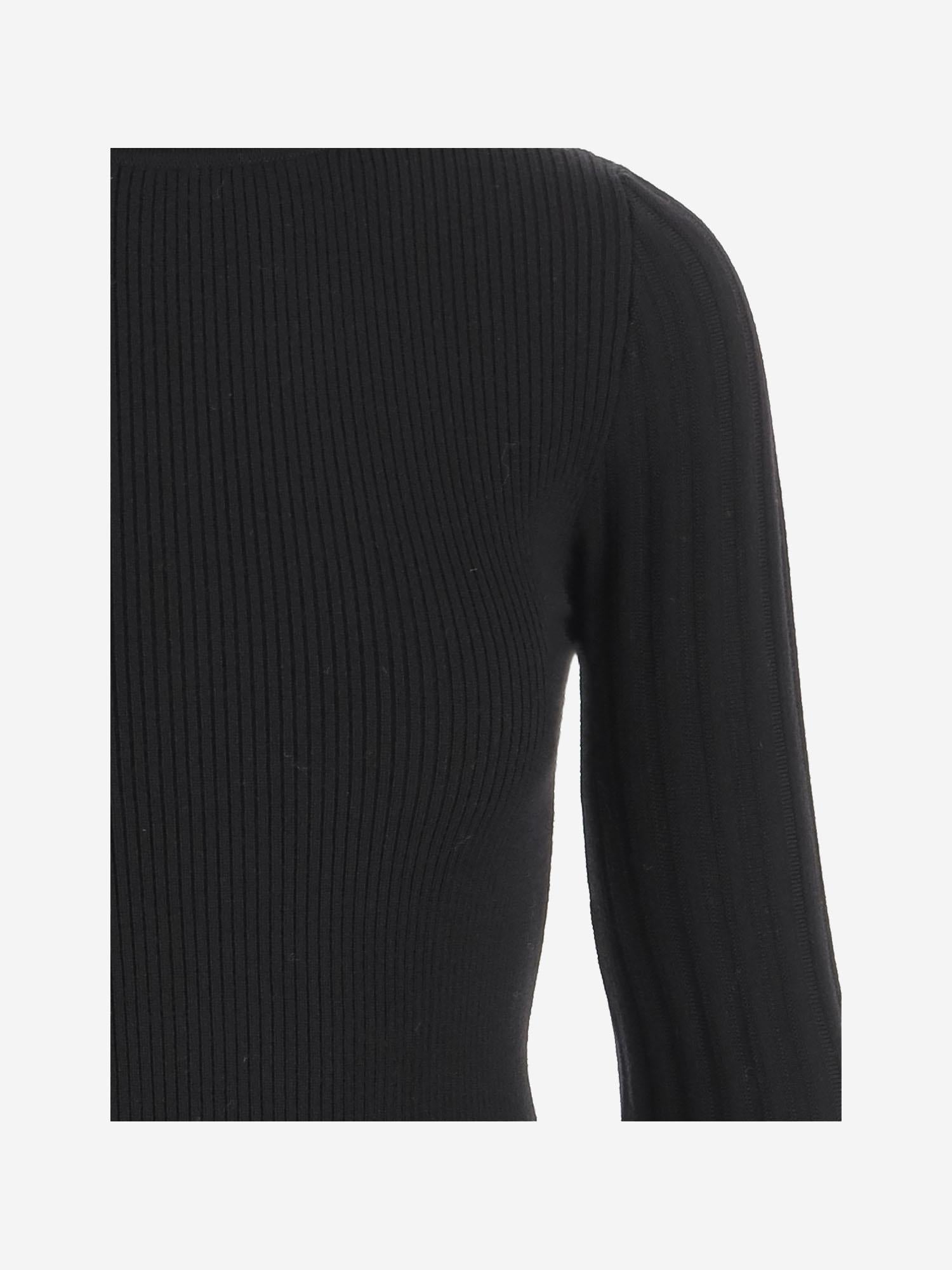 MAGLIA A COLLO ALTO CON MANICHE SVASATE A544M169A N0990 BLUMARINE