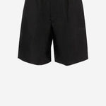 PANTALONI CORTI IN NYLON HSO833PA0037 001 AMI 