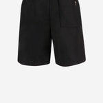 PANTALONI CORTI IN NYLON HSO833PA0037 001 AMI 