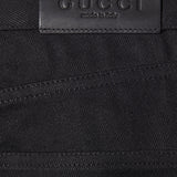 Jeans in denim di cotone con dettaglio morsetto 860844 XDDFZ1000 GUCCI 