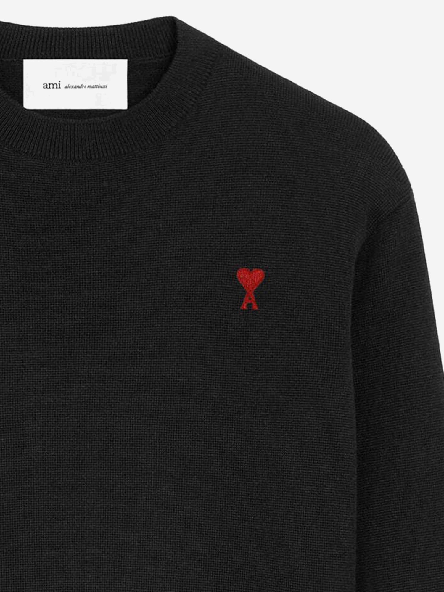 MAGLIONE IN LANA CON LOGO HKS826001 009 AMI 