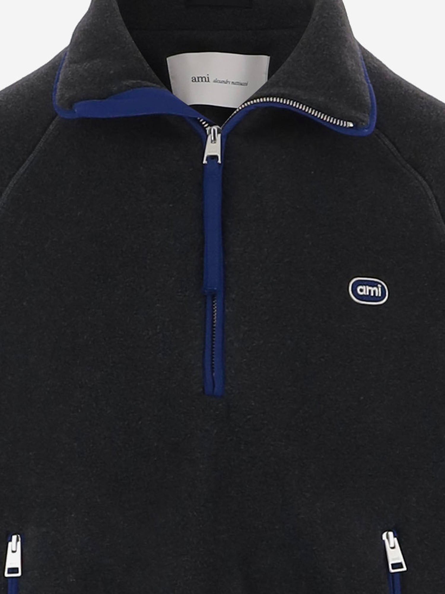 GIUBBOTTO IN TESSUTO TECNICO CON LOGO UJK943PL0115 A189 AMI 