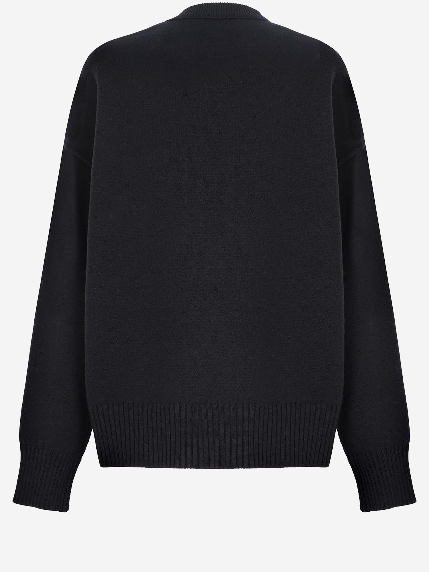 MAGLIONE IN LANA CON LOGO UKS838018 009 AMI 