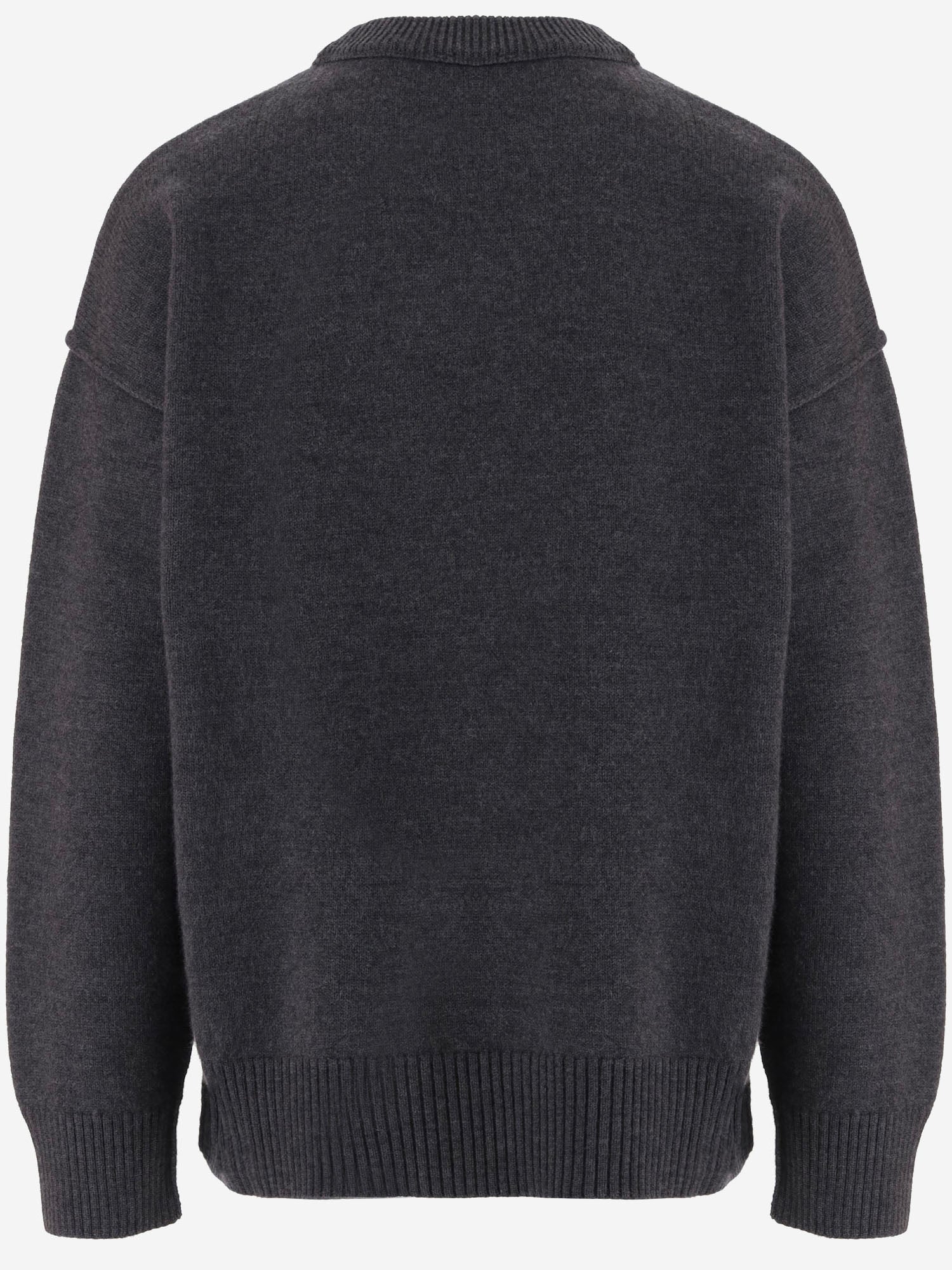 MAGLIONE IN LANA CON LOGO UKS838018 084 AMI 