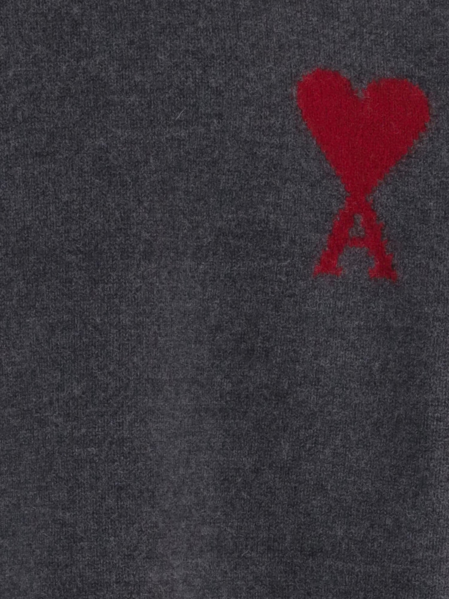 MAGLIONE IN LANA CON LOGO UKS838018 084 AMI 