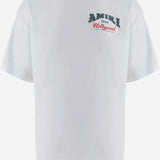 T-SHIRT IN COTONE CON STAMPA LOGO AM426JR034 003O AMIRI 