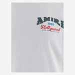 T-SHIRT IN COTONE CON STAMPA LOGO AM426JR034 003O AMIRI 