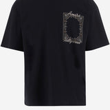 T-SHIRT IN COTONE CON LOGO JR004 0002 AMIRI 