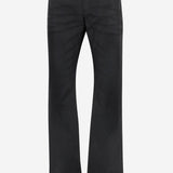 Pantaloni in denim di cotone stretch spalmato A009VU XDDH31000 GUCCI 