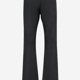 Pantaloni in denim di cotone stretch spalmato A009VU XDDH31000 GUCCI 