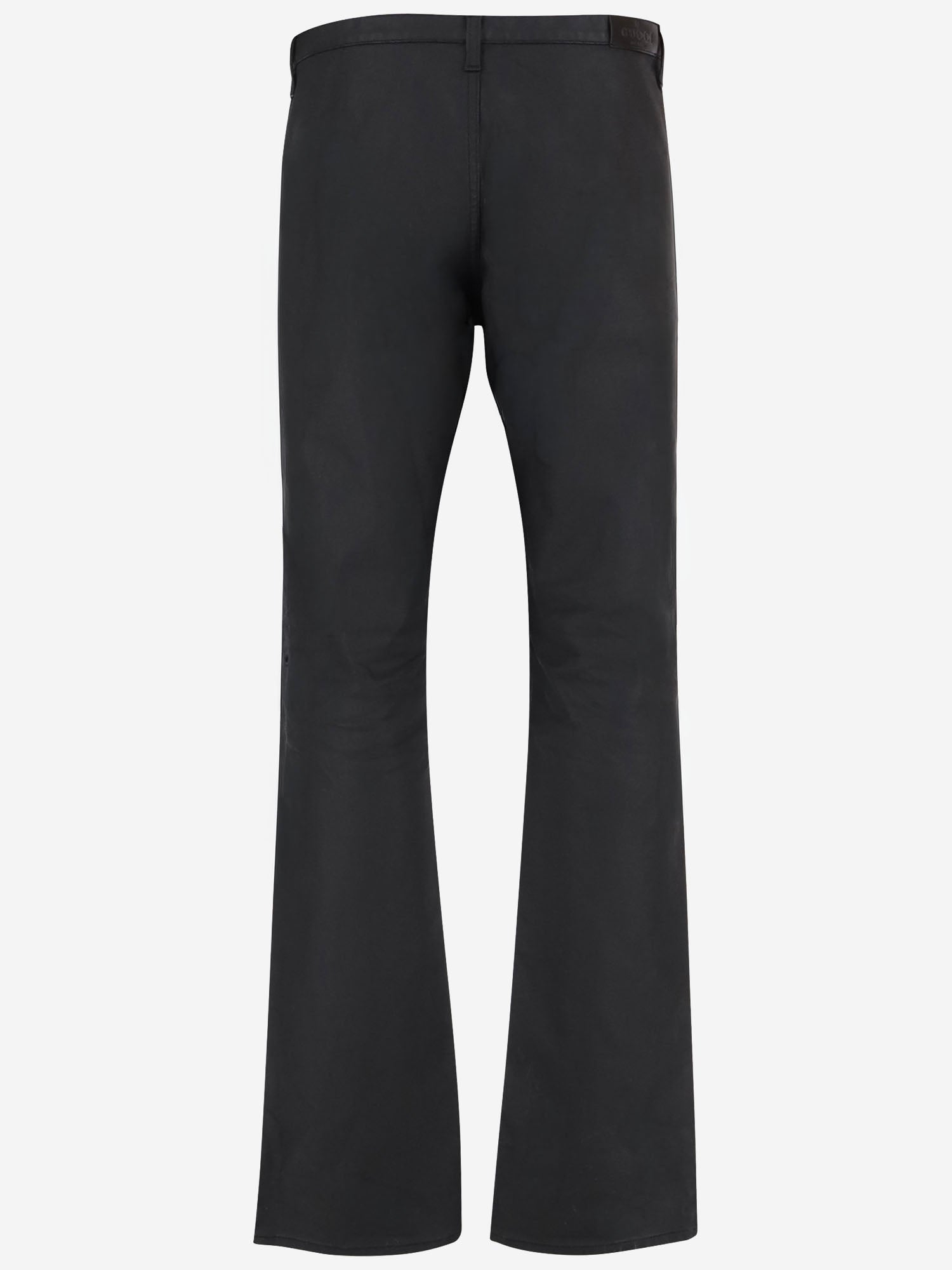 Pantaloni in denim di cotone stretch spalmato A009VU XDDH31000 GUCCI 