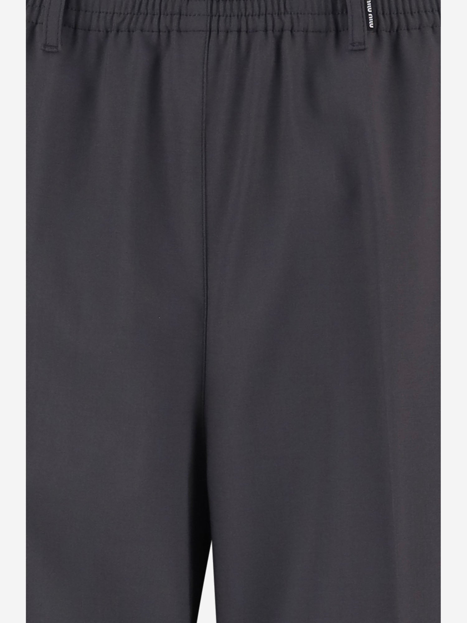 PANTALONI IN LANA STRETCH MP2047 17L4F063H MIU MIU 