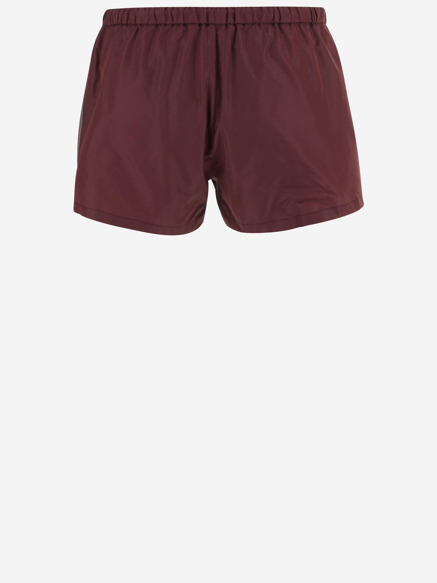 SHORTS IN NYLON CON LOGO MP1809 121IF0399 MIU MIU 