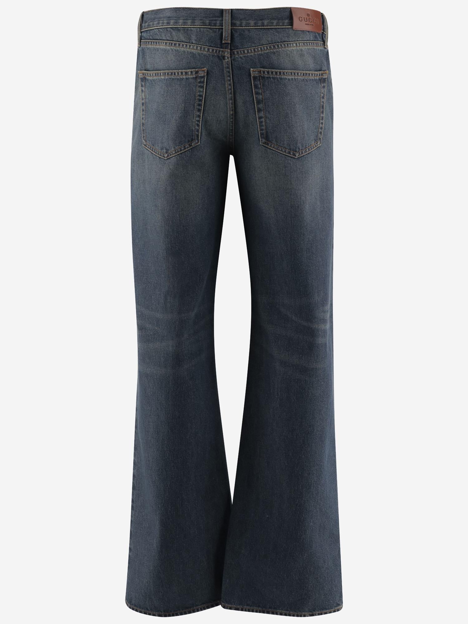 Jeans in denim di cotone con dettaglio morsetto 860844 XDDF04011 GUCCI 