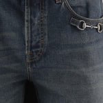 Jeans in denim di cotone con dettaglio morsetto 860844 XDDF04011 GUCCI 