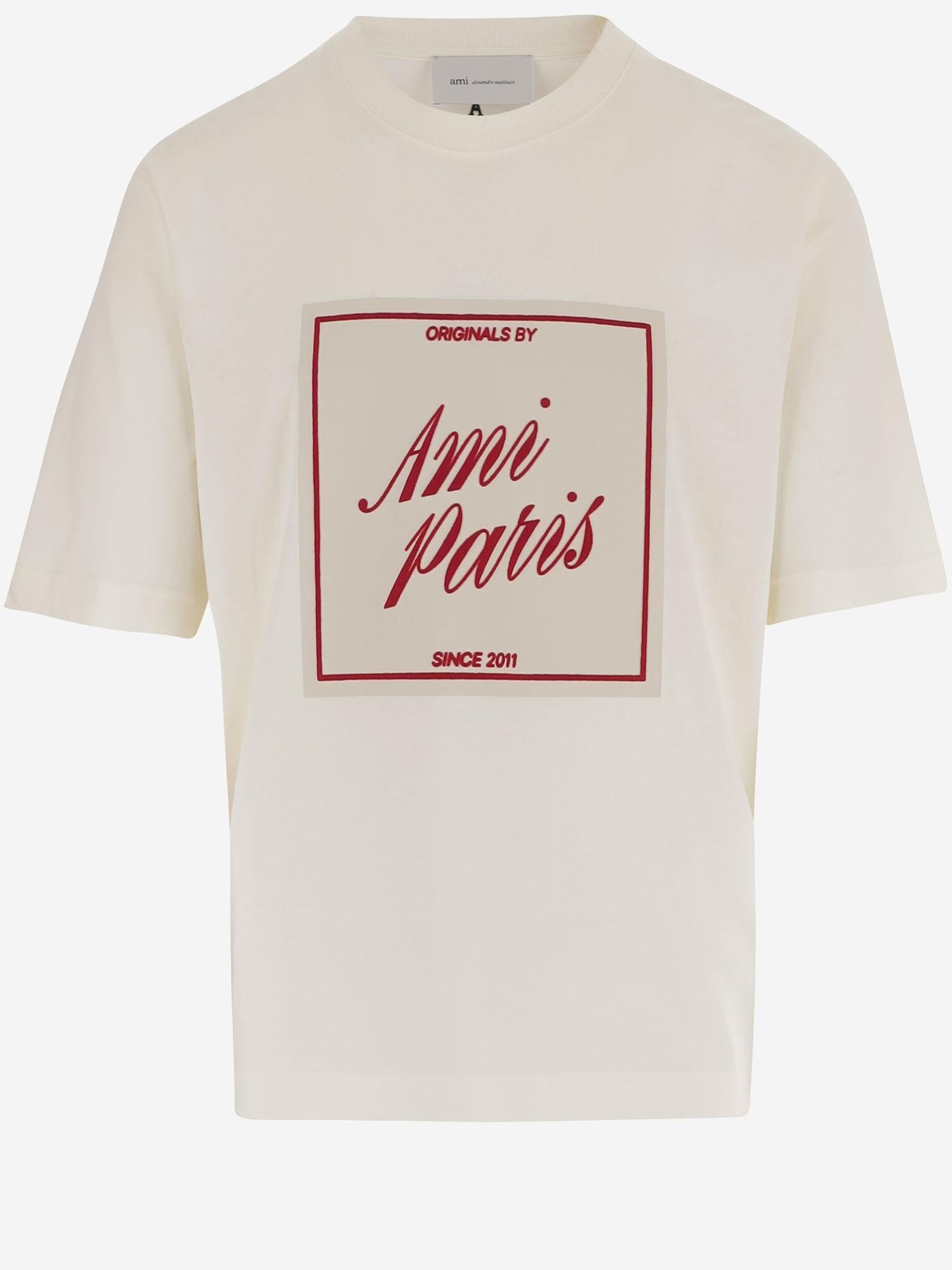 T-SHIRT IN COTONE CON STAMPA AMI PARIS HERITAGE UTS385726 136 AMI 
