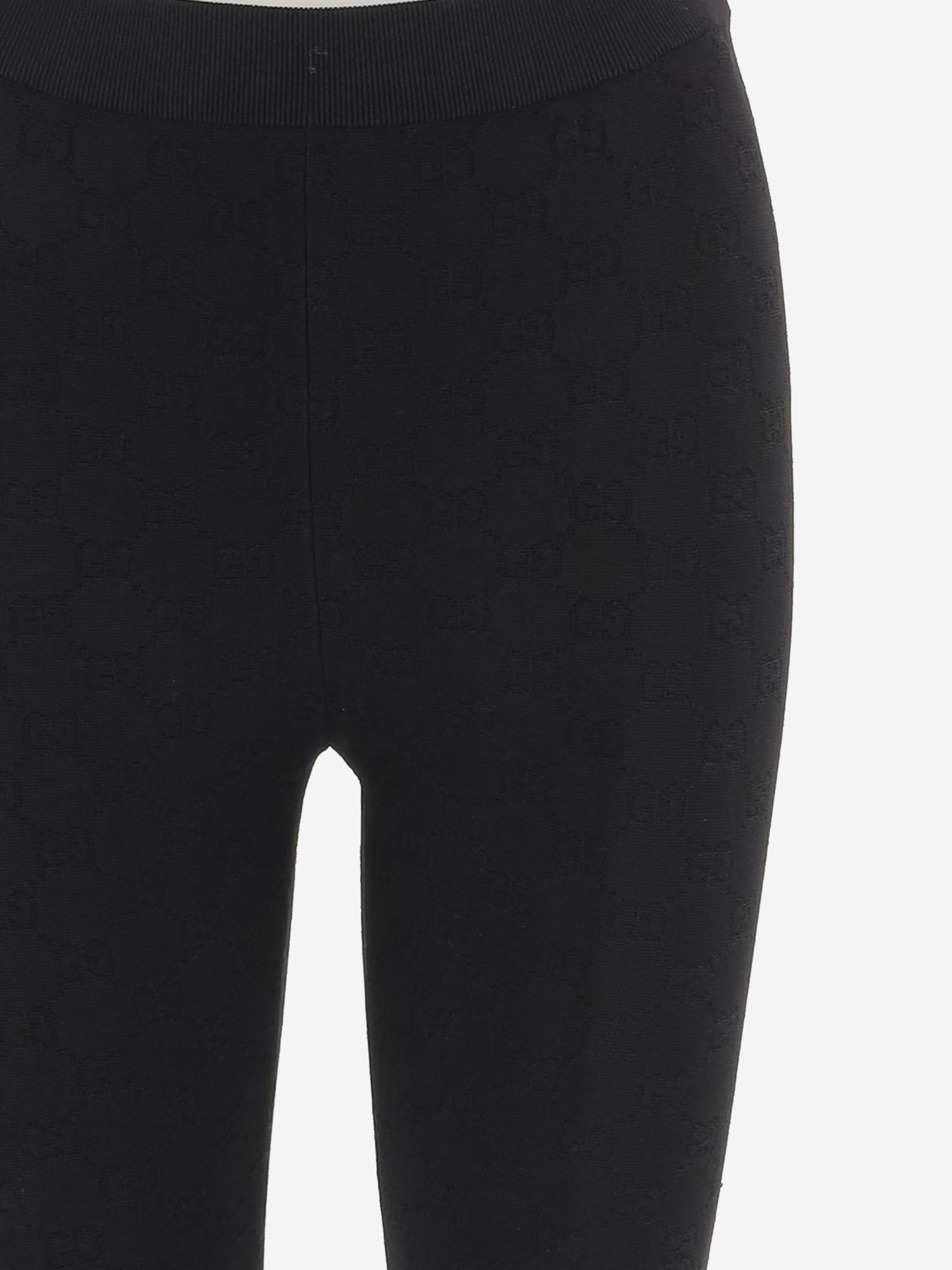 PANTALONI IN VISCOSA TECNICA CON MOTIVO GG 852277 XKFCP1000 GUCCI 