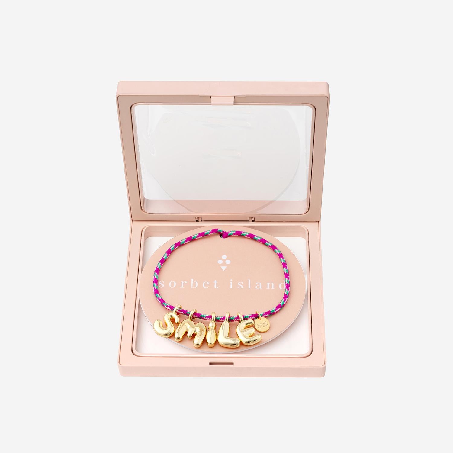 BRACCIALE IN TESSUTO E METALLO BUBBLELETTERSGOLDPLATED SMILE SORBET ISLAND 