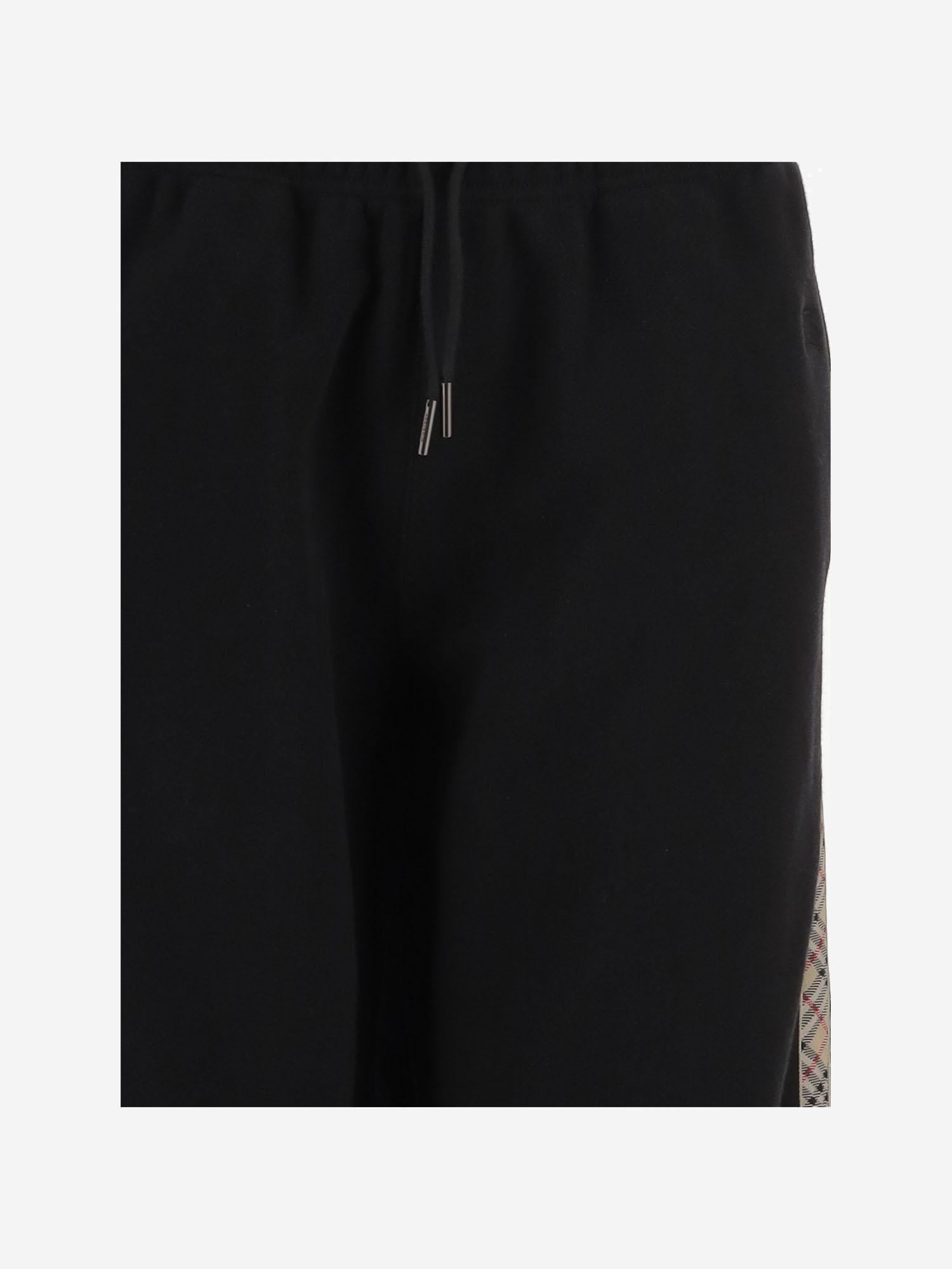 PANTALONI IN COTONE CON FINITURE CHECK 8121159 BLACK BURBERRY 