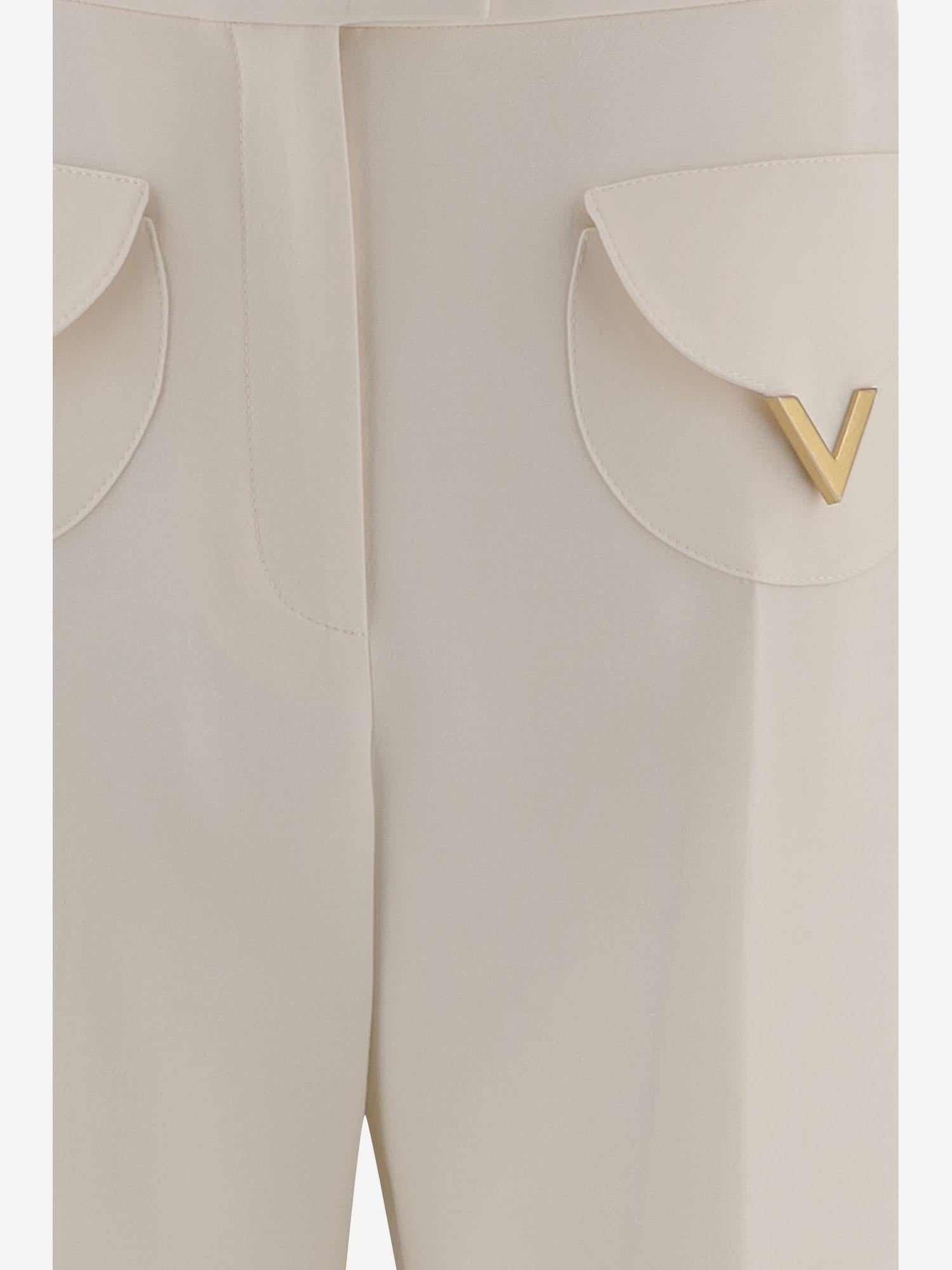 PANTALONI IN LANA E SETA 8B3RB725 1CFA03 VALENTINO 