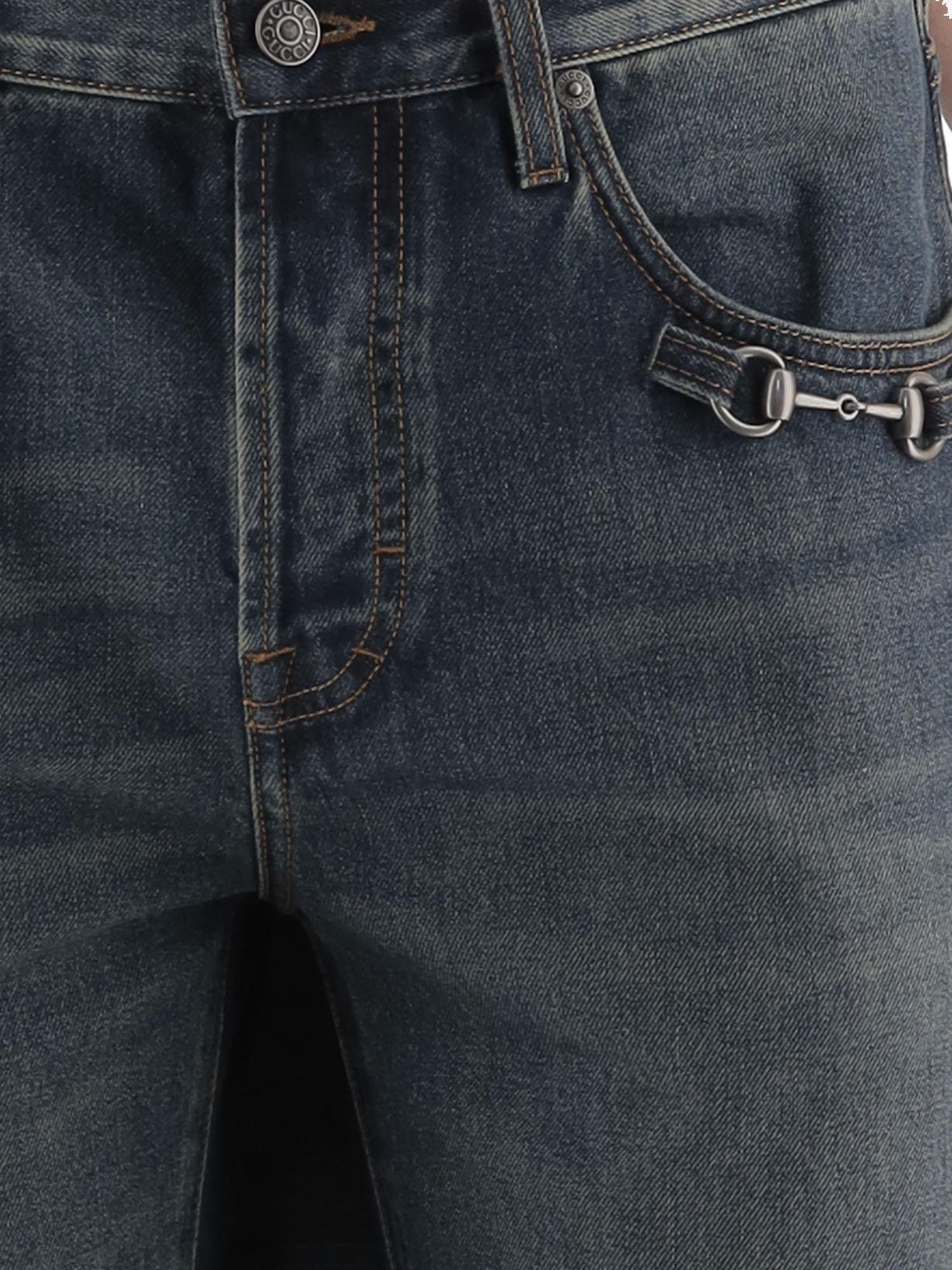 Jeans in denim di cotone con dettaglio morsetto 860844 XDDF04011 GUCCI 