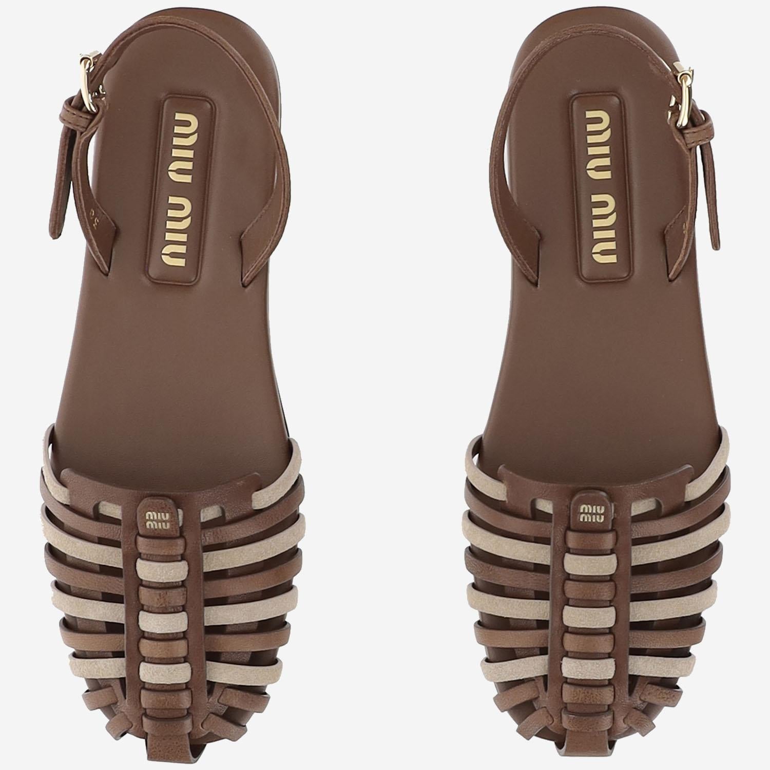 Mules in pelle e suede 5X610E MHDF05C8 MIU MIU 