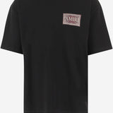 T-SHIRT IN COTONE CON STAMPA AMTOJR 1063001 AMIRI 