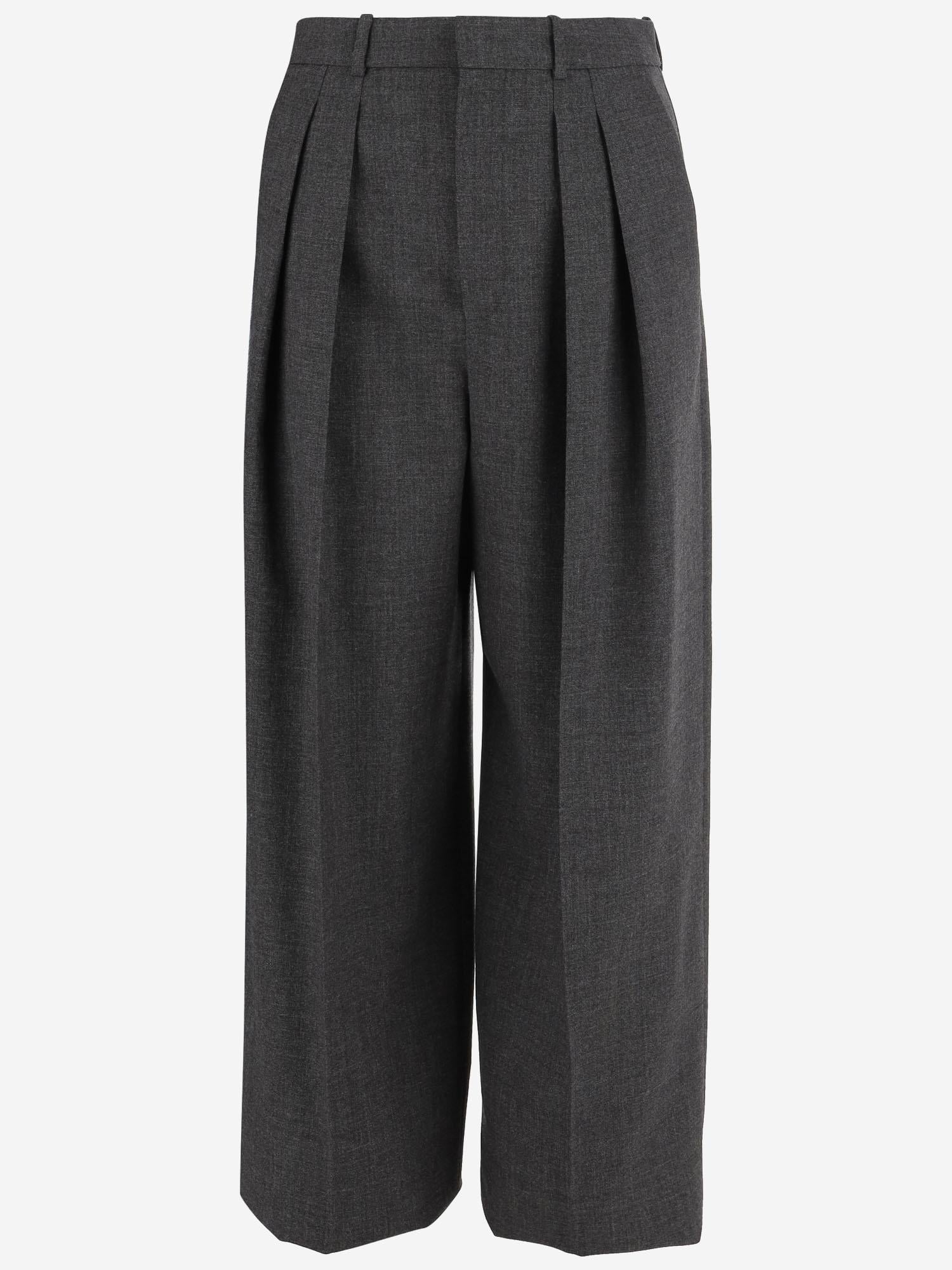 Pantaloni sartoriali a vita alta e gamba ampia in lana 824389 Y5K321473 SAINT LAURENT 