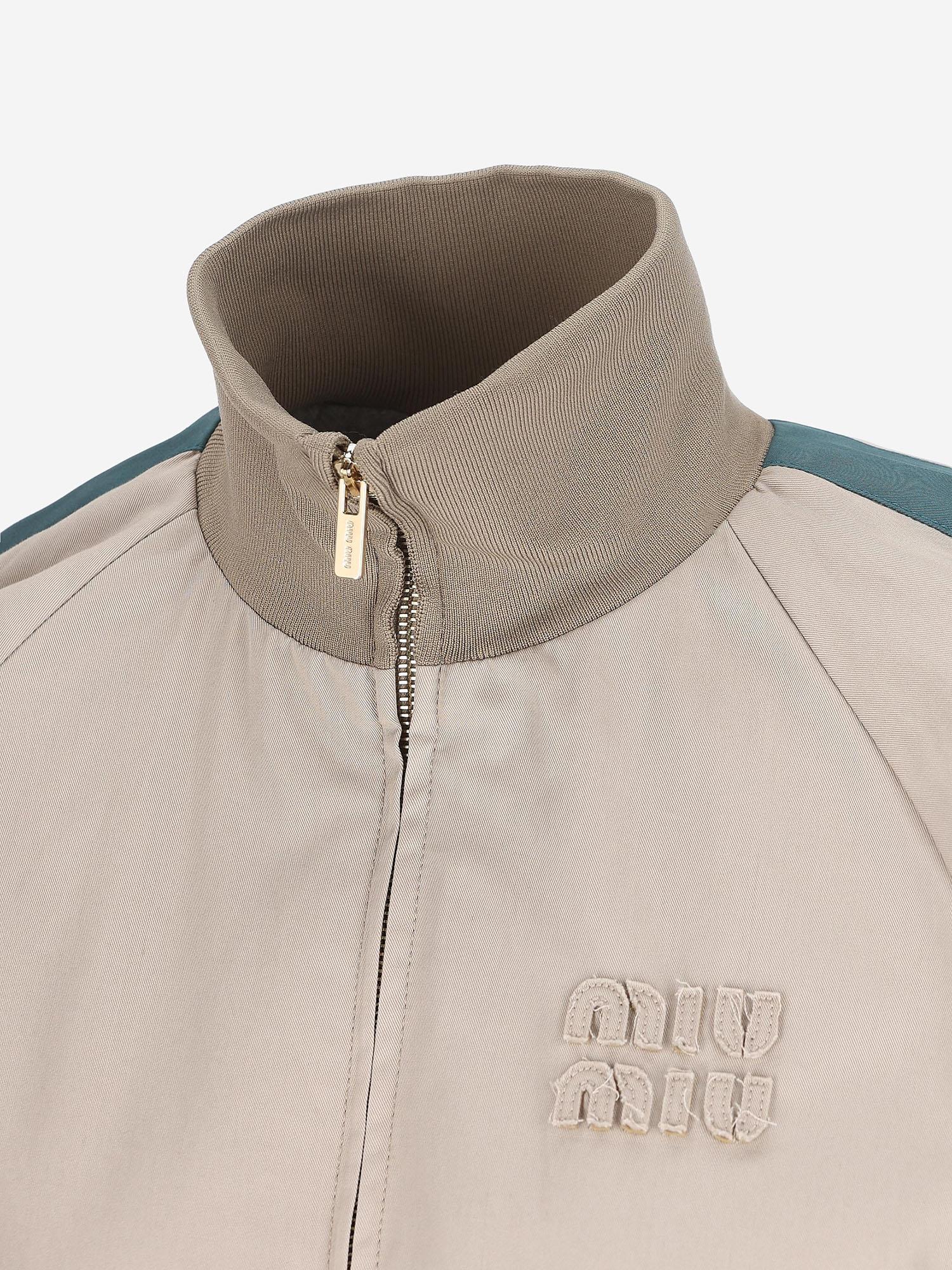 GIACCA IN COTONE CON LOGO ML1466 19CTF0D3K MIU MIU 