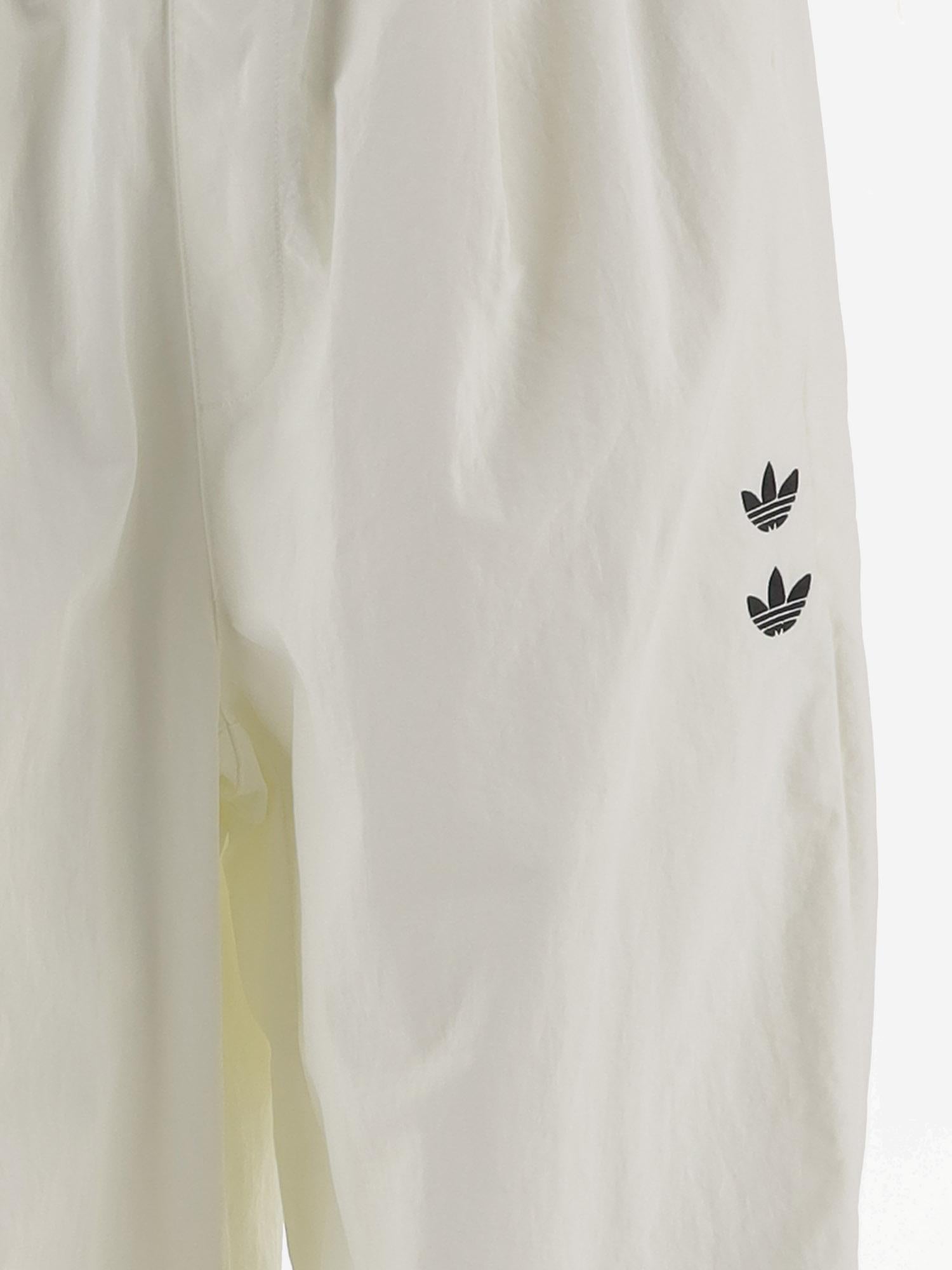PANTALONI DA JOGGING CON LOGO E BANDE LATERALI KT2617 OFFWHITE ADIDAS X WILLY CHAVARRIA 