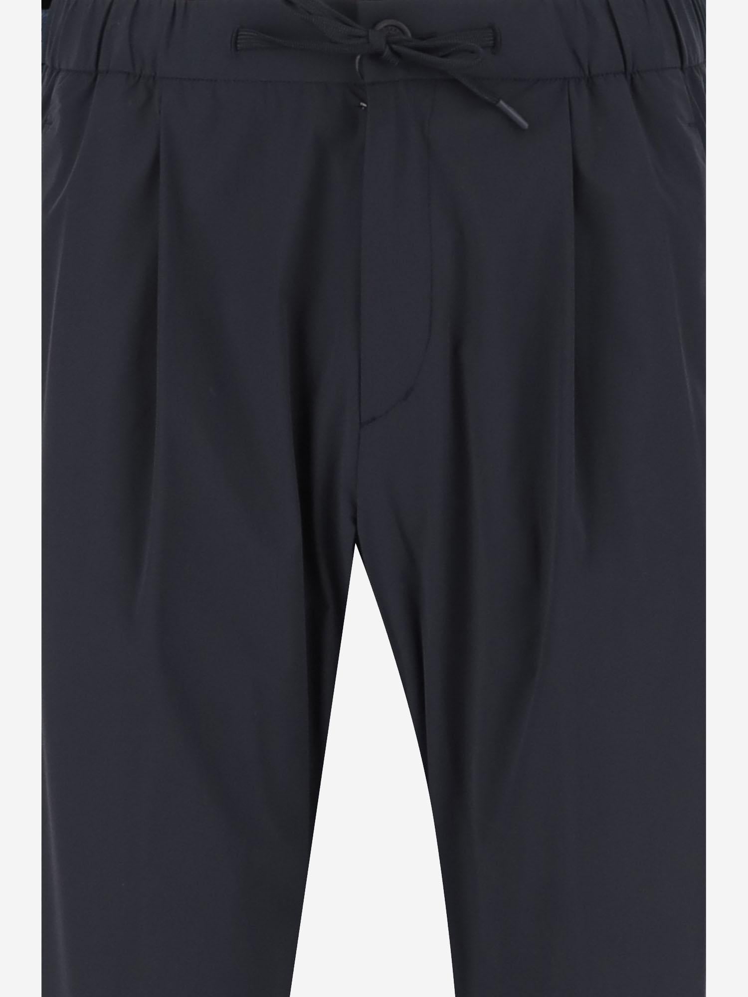 PANTALONI IN TESSUTO TECNICO STRETCH PT000077U 12691Z9201 HERNO 