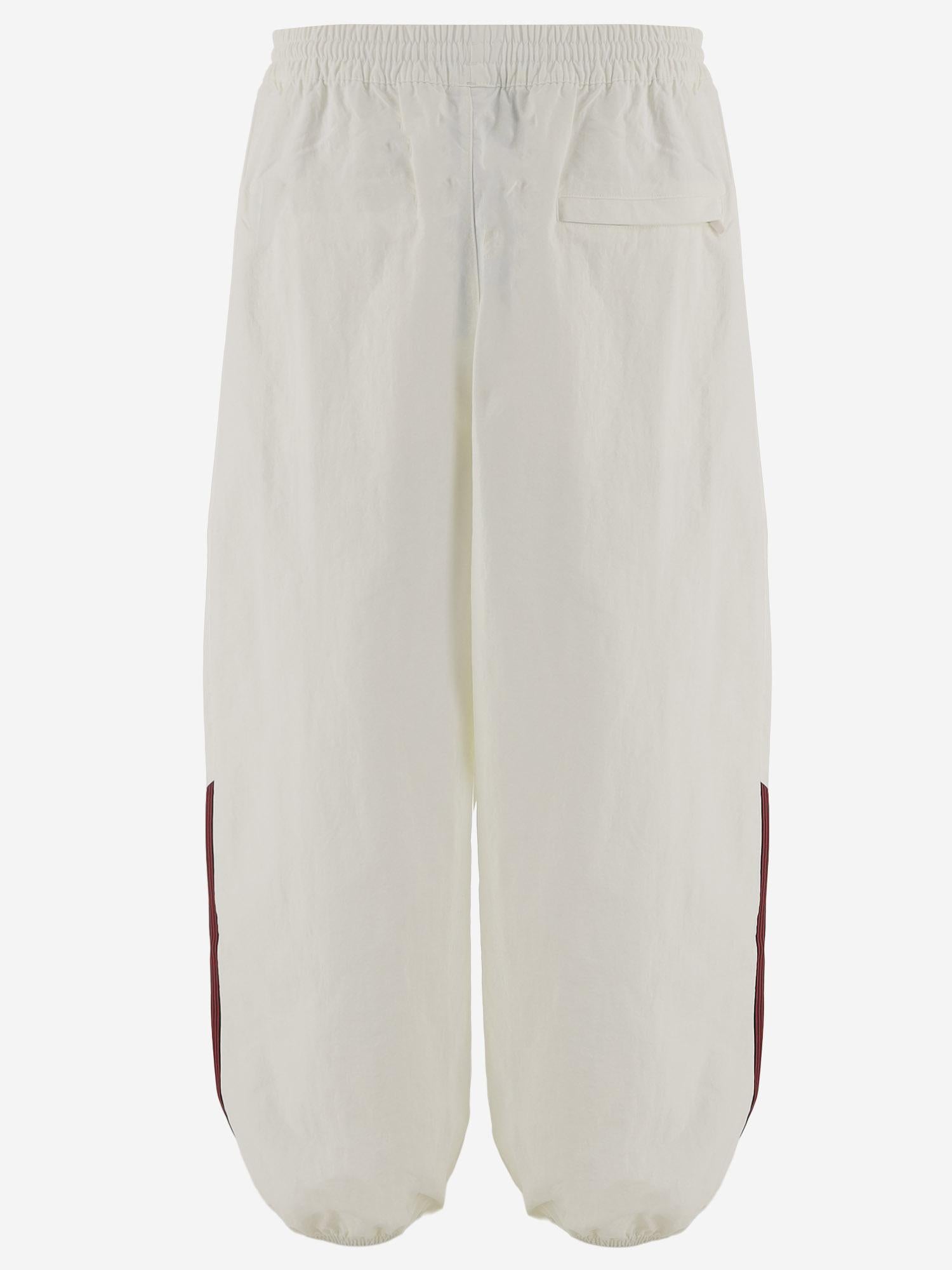 PANTALONI DA JOGGING CON LOGO E BANDE LATERALI KT2617 OFFWHITE ADIDAS X WILLY CHAVARRIA 
