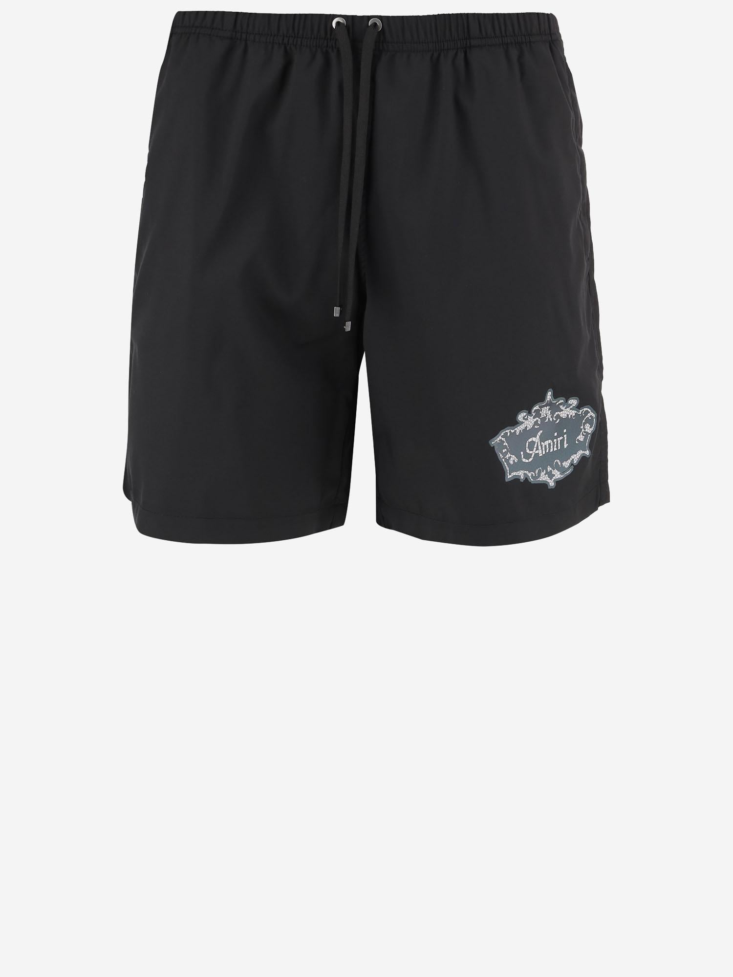 SHORTS DA BAGNO IN TESSUTO TECNICO AMBOSW 1008001 AMIRI 