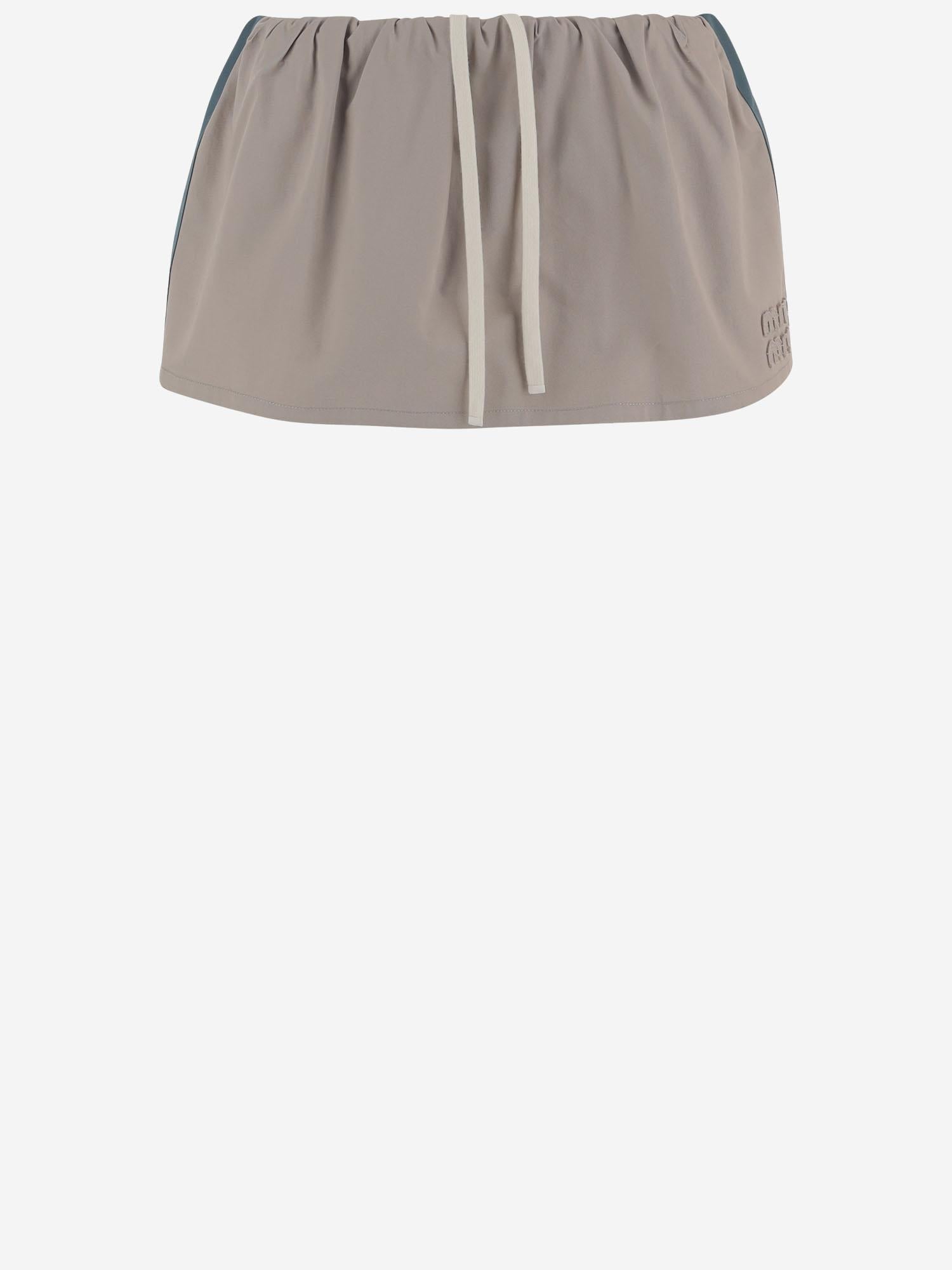 GONNA CORTA IN COTONE CON LOGO MG2638 19CTF0D3K MIU MIU 