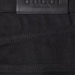 Jeans in denim di cotone con dettaglio morsetto 860844 XDDFZ1000 GUCCI 