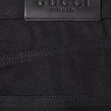 Jeans in denim di cotone con dettaglio morsetto 860844 XDDFZ1000 GUCCI 