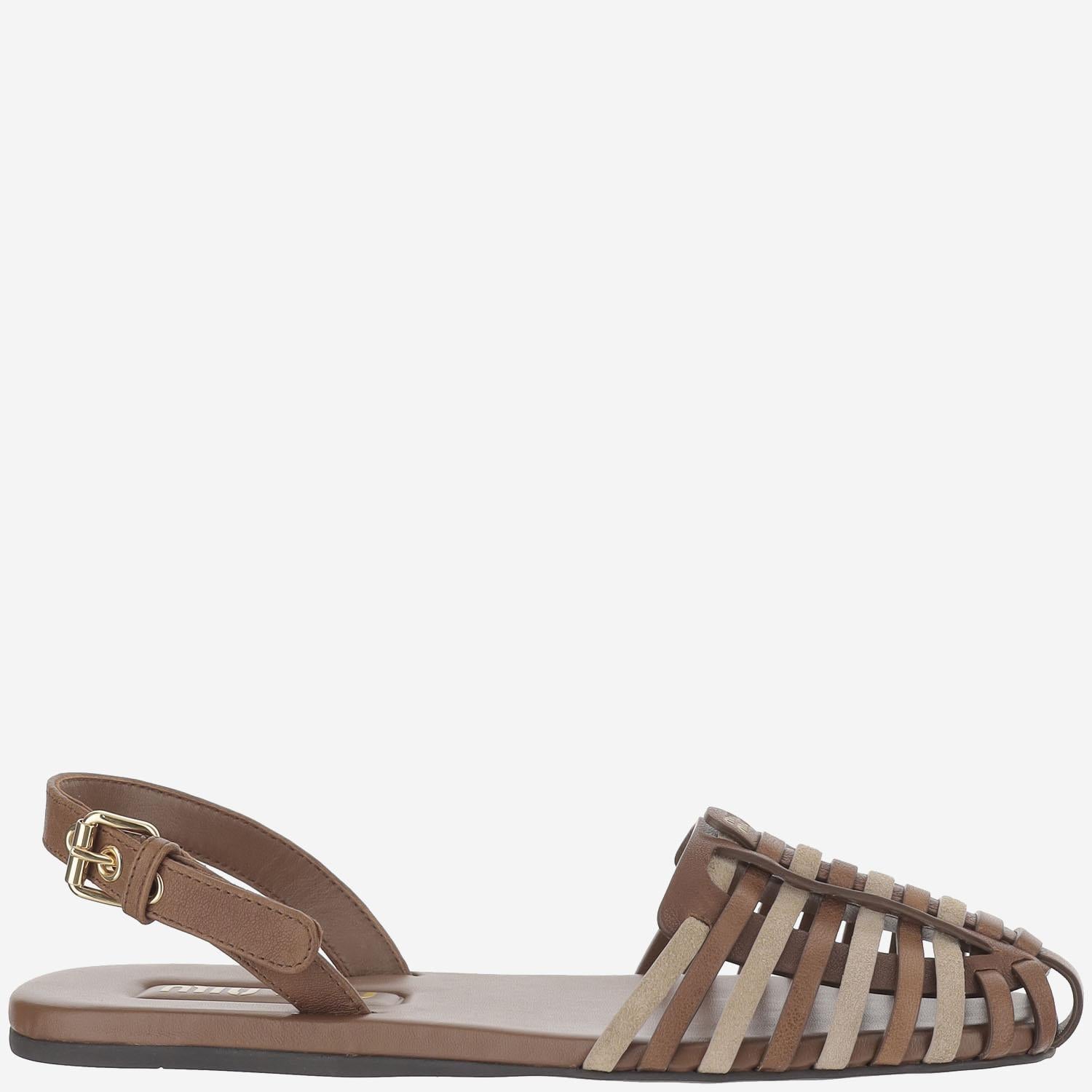 Mules in pelle e suede 5X610E MHDF05C8 MIU MIU 