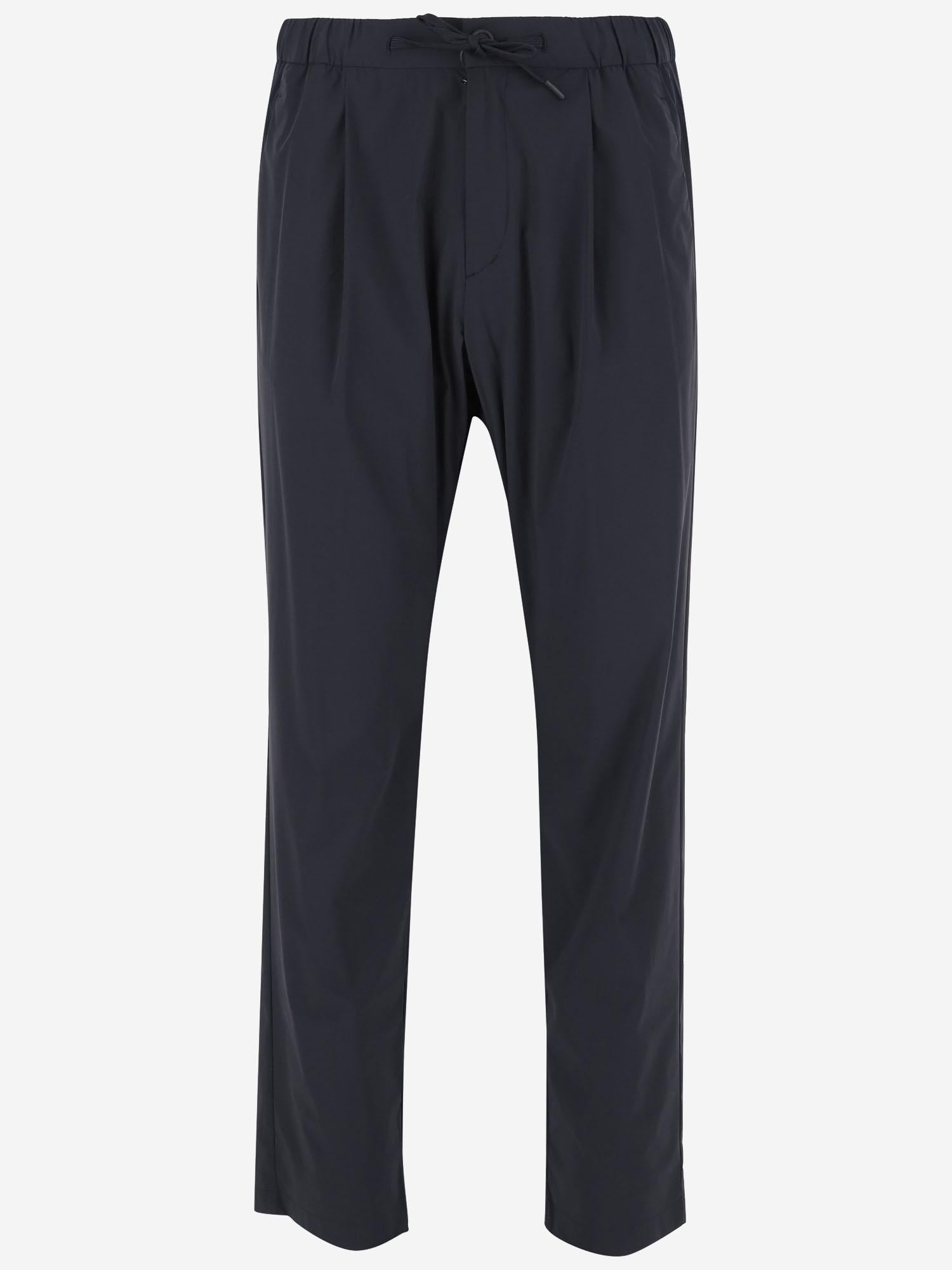 PANTALONI IN TESSUTO TECNICO STRETCH PT000077U 12691Z9201 HERNO 