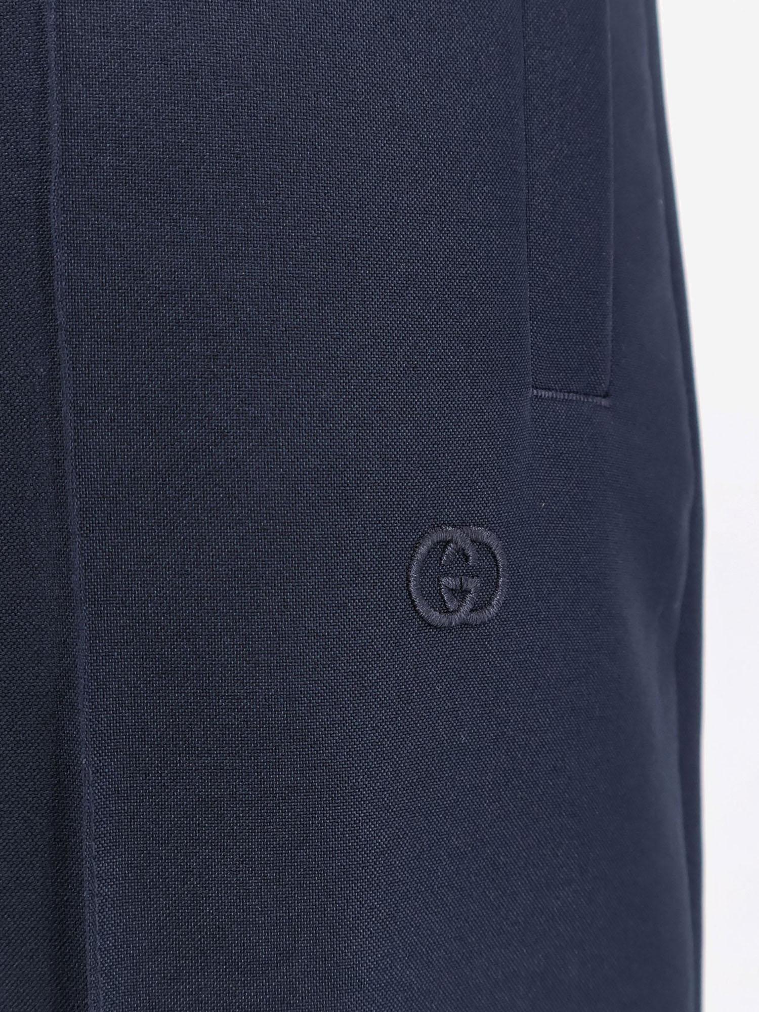PANTALONI IN TESSUTO TECNICO CON LOGO 852345 ZAFKB4847 GUCCI 
