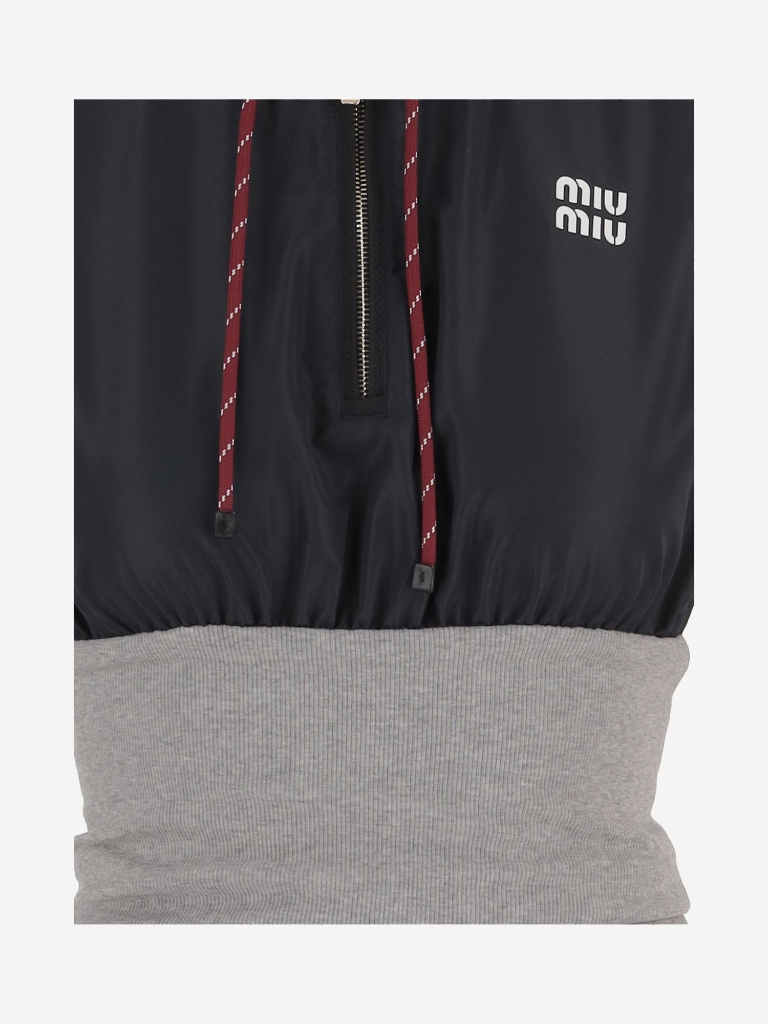 ABITO SENZA MANICHE CON CAPPUCCIO E ZIP MF6223 19ECF005R MIU MIU 