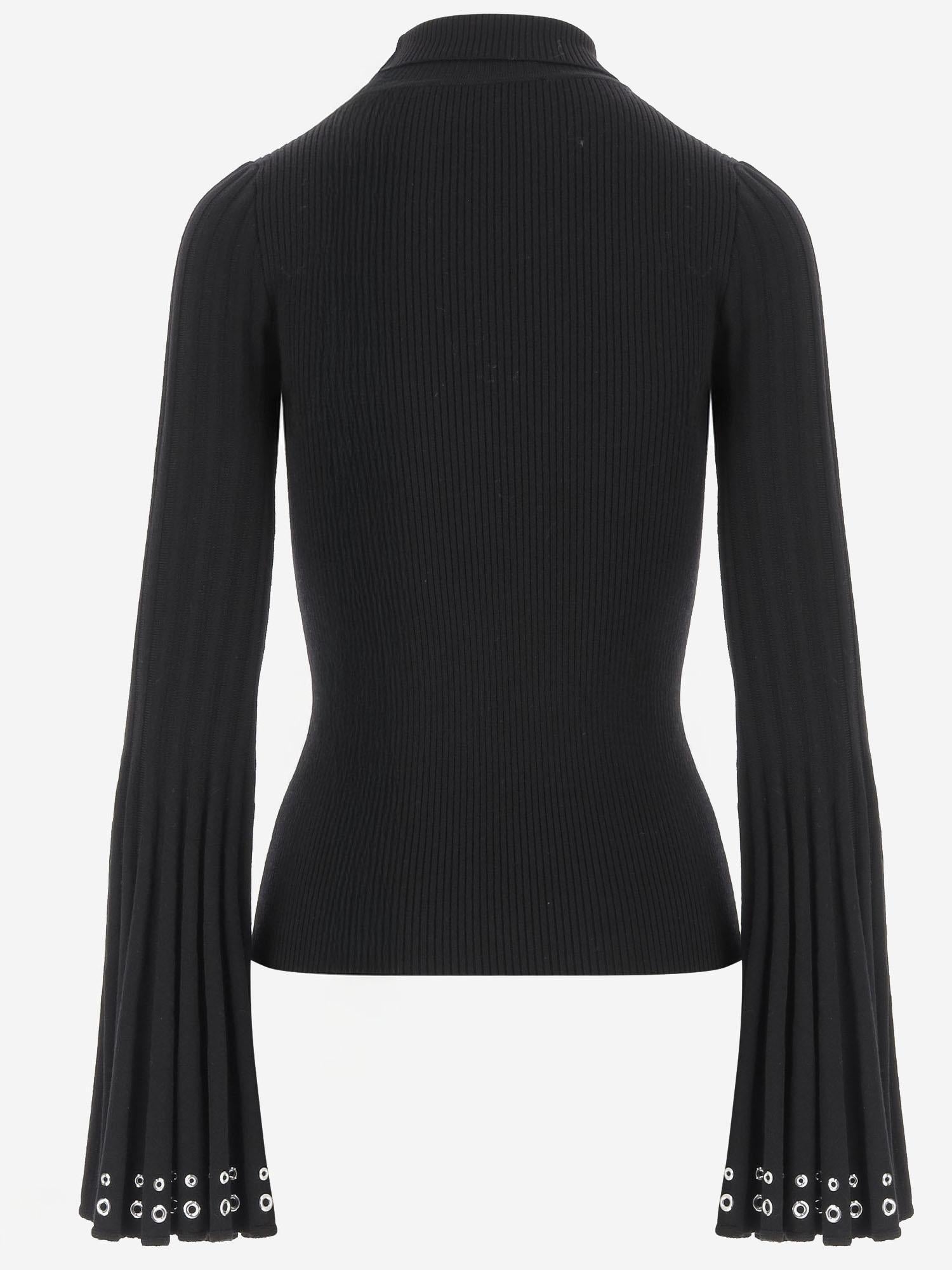MAGLIA A COLLO ALTO CON MANICHE SVASATE A544M169A N0990 BLUMARINE 