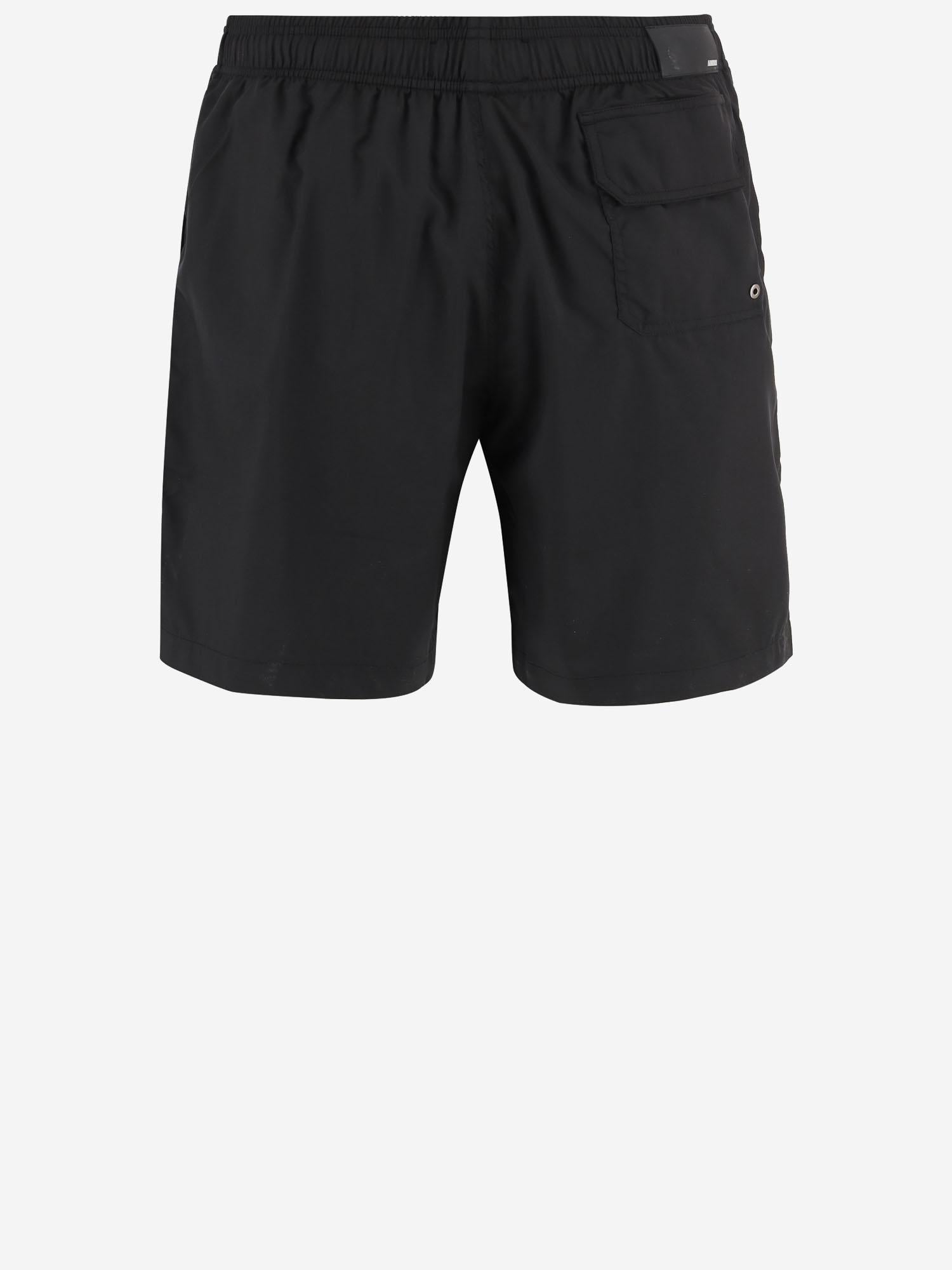 SHORTS DA BAGNO IN TESSUTO TECNICO AMBOSW 1008001 AMIRI 