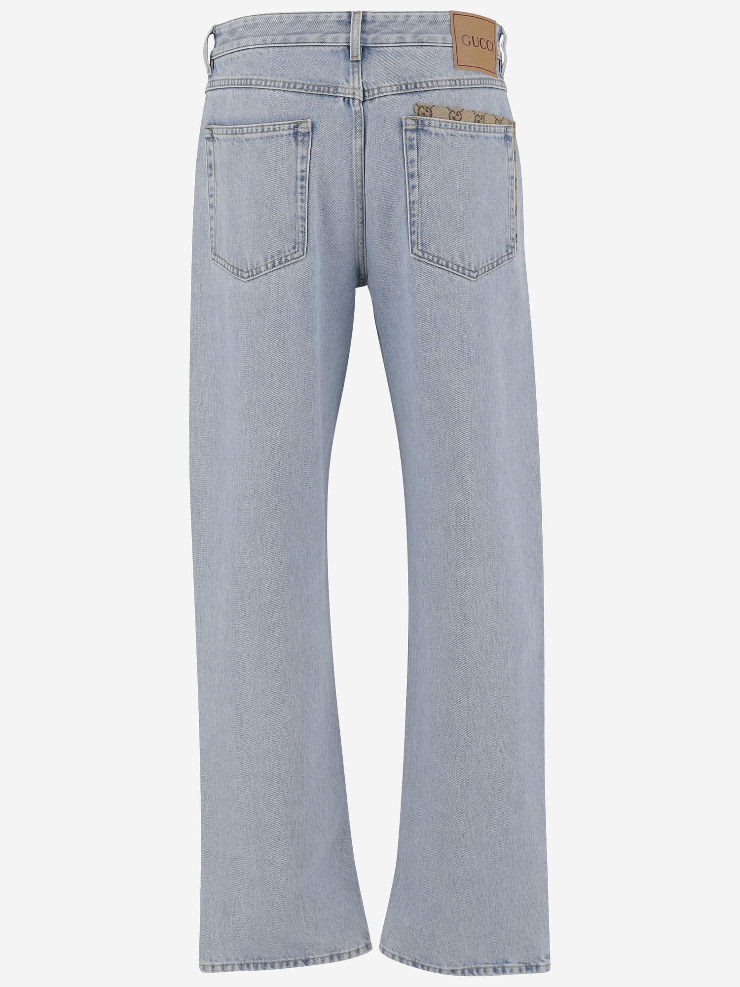 Pantaloni in denim délavé con inserto GG 835219 XDDCY4452 GUCCI 