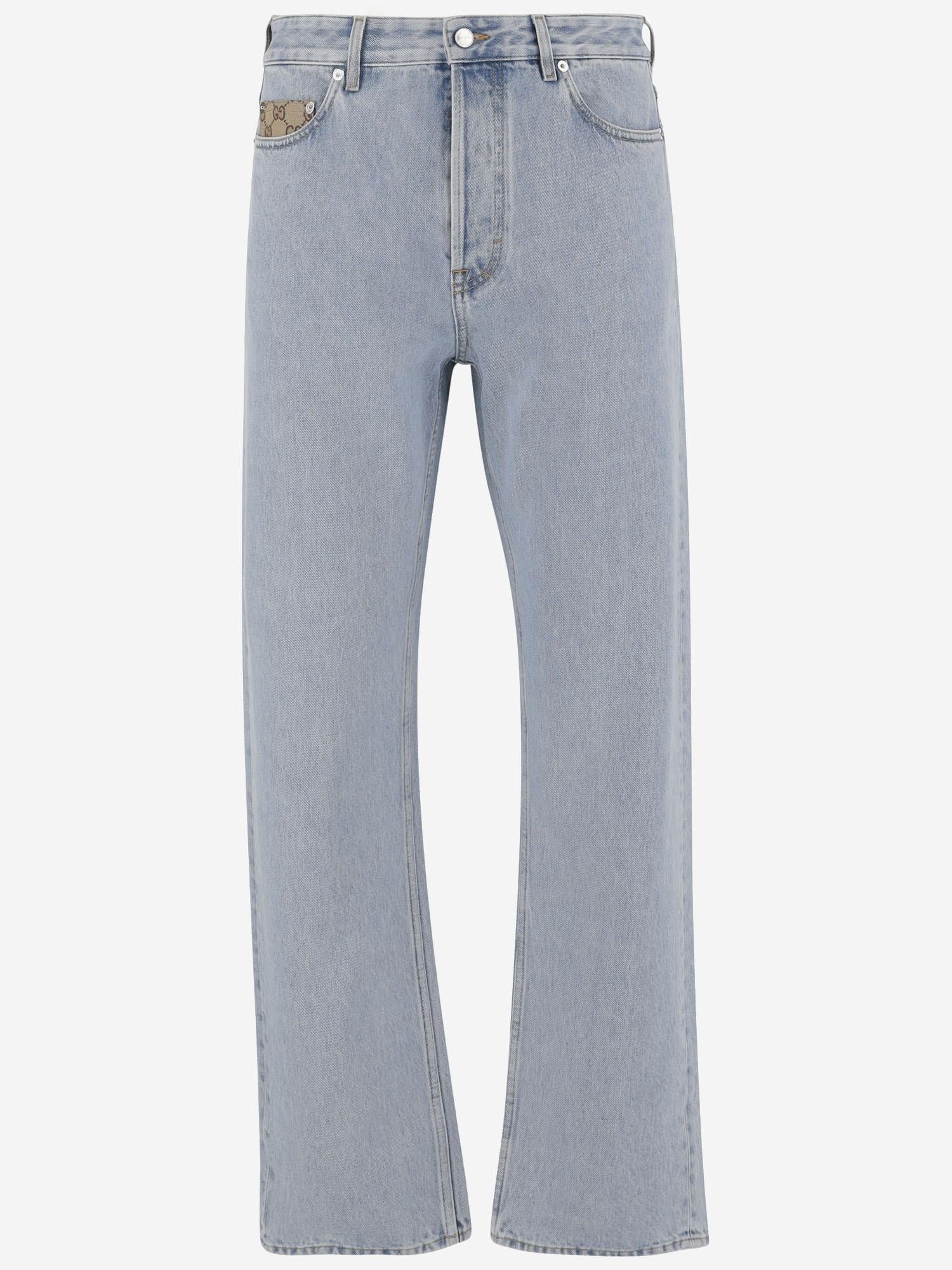 Pantaloni in denim délavé con inserto GG 835219 XDDCY4452 GUCCI 