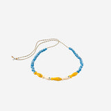 Collana in tessuto e perle di vetro FISHGLASSBEAD ORANGEBEIGE SORBET ISLAND 